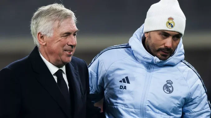 0_Carlo-Ancelotti-L-head-coach-of-Real-Madrid-CF-hugs-his