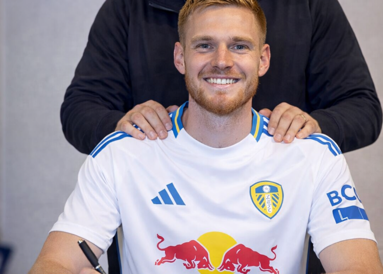 DONE DEAL:DANIEL FARKE PERSONALLY SEALS JØRGEN STRAND LARSEN SIGNING FOR LEEDS UNITED.